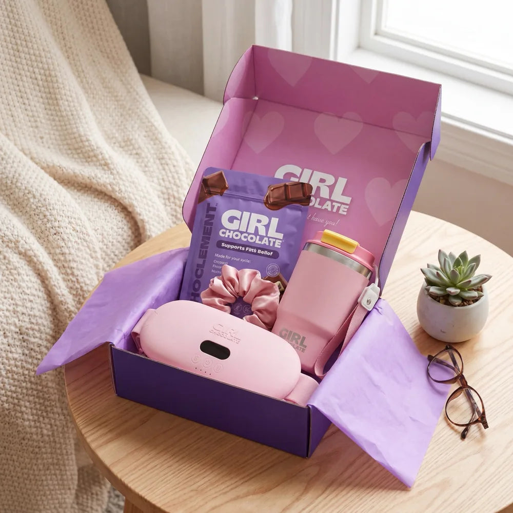 The Period Relief Kit styled with candle and plant